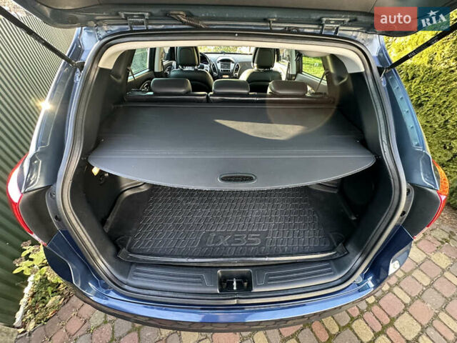 Синій Хендай іх35, об'ємом двигуна 2 л та пробігом 179 тис. км за 12999 $, фото 31 на Automoto.ua