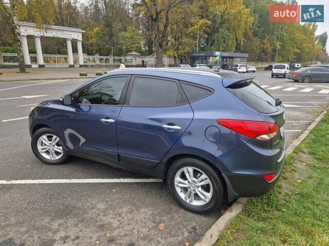 Синий Хендай их35, объемом двигателя 2 л и пробегом 138 тыс. км за 12400 $, фото 5 на Automoto.ua