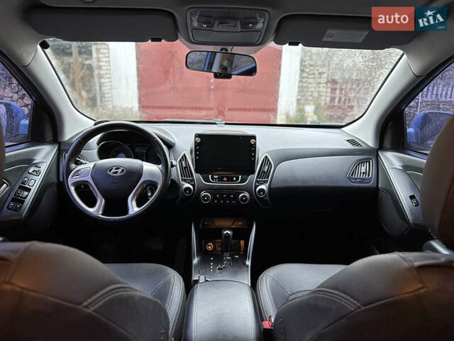 Синий Хендай их35, объемом двигателя 2 л и пробегом 158 тыс. км за 13999 $, фото 1 на Automoto.ua