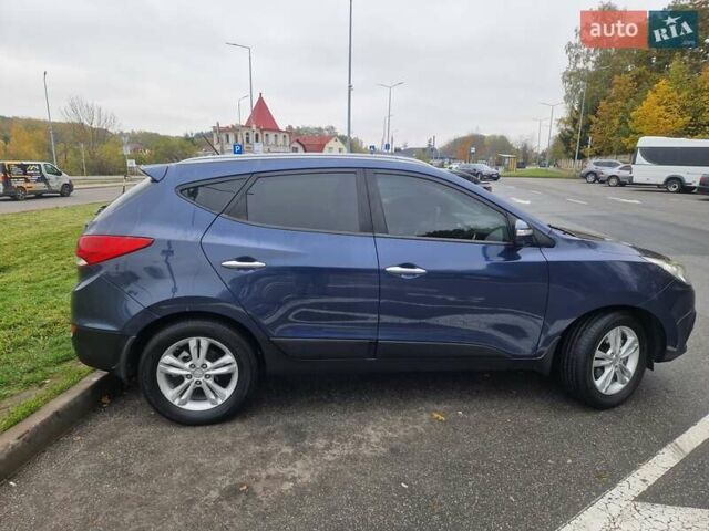 Синий Хендай их35, объемом двигателя 2 л и пробегом 138 тыс. км за 12400 $, фото 10 на Automoto.ua