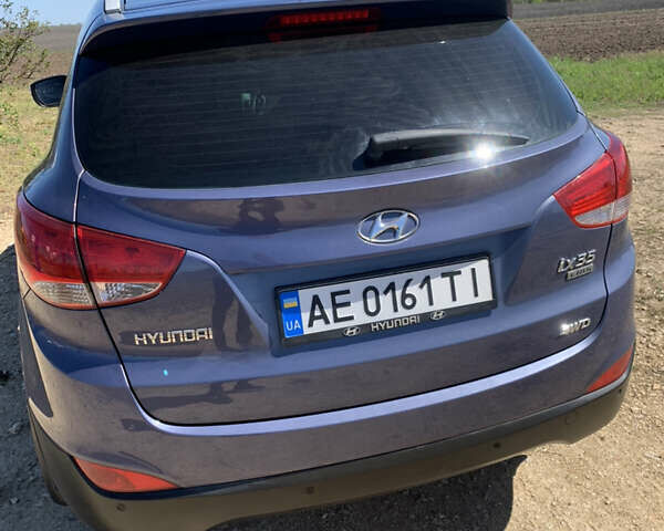 Синій Хендай іх35, об'ємом двигуна 2 л та пробігом 193 тис. км за 13000 $, фото 1 на Automoto.ua