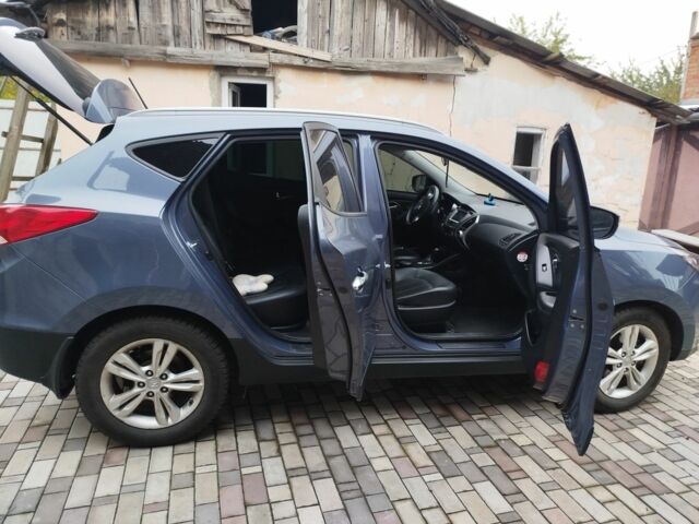 Синий Хендай их35, объемом двигателя 2 л и пробегом 200 тыс. км за 11000 $, фото 5 на Automoto.ua