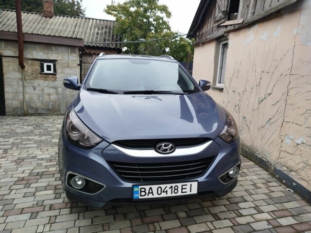 Синий Хендай их35, объемом двигателя 2 л и пробегом 200 тыс. км за 11000 $, фото 2 на Automoto.ua