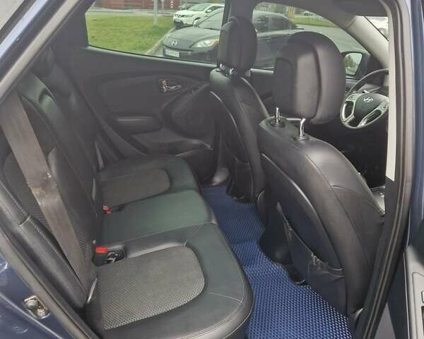 Синий Хендай их35, объемом двигателя 2 л и пробегом 138 тыс. км за 12400 $, фото 25 на Automoto.ua