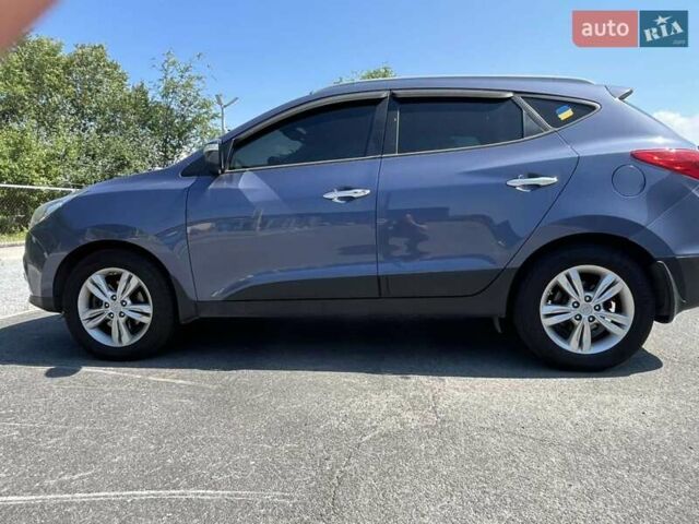 Синий Хендай их35, объемом двигателя 2 л и пробегом 133 тыс. км за 12399 $, фото 8 на Automoto.ua