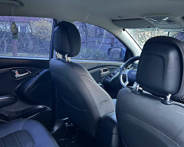 Синий Хендай их35, объемом двигателя 2 л и пробегом 158 тыс. км за 13999 $, фото 8 на Automoto.ua