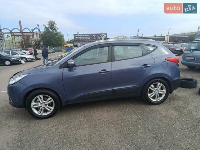 Синий Хендай их35, объемом двигателя 2 л и пробегом 178 тыс. км за 11200 $, фото 6 на Automoto.ua