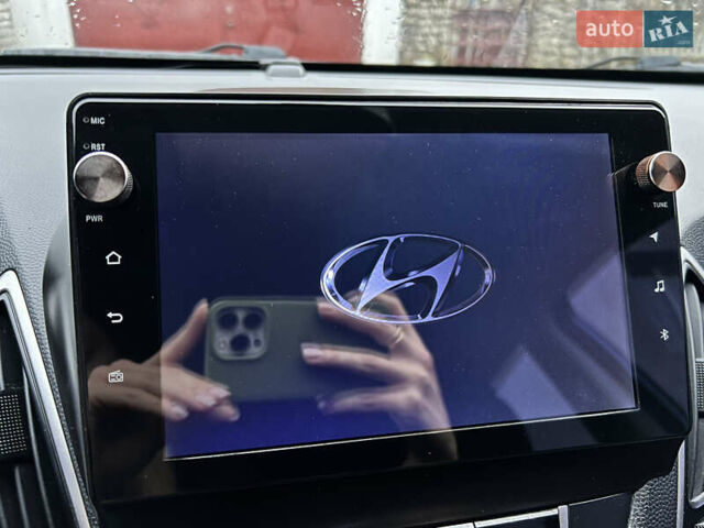 Синий Хендай их35, объемом двигателя 2 л и пробегом 158 тыс. км за 13999 $, фото 5 на Automoto.ua