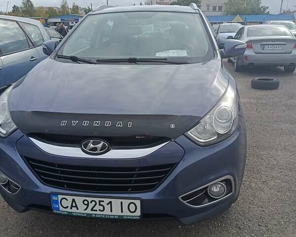 Синий Хендай их35, объемом двигателя 2 л и пробегом 178 тыс. км за 11200 $, фото 7 на Automoto.ua