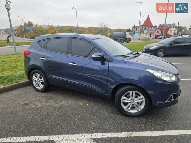 Синий Хендай их35, объемом двигателя 2 л и пробегом 138 тыс. км за 11500 $, фото 11 на Automoto.ua