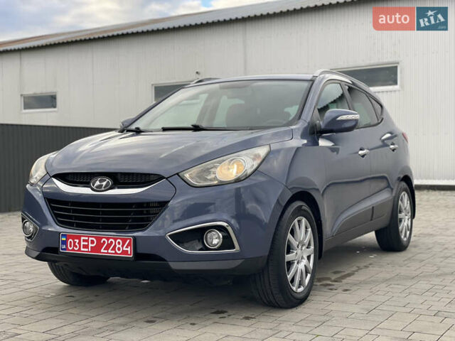 Синій Хендай іх35, об'ємом двигуна 2 л та пробігом 238 тис. км за 13300 $, фото 11 на Automoto.ua