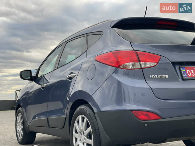 Синій Хендай іх35, об'ємом двигуна 2 л та пробігом 238 тис. км за 13300 $, фото 32 на Automoto.ua