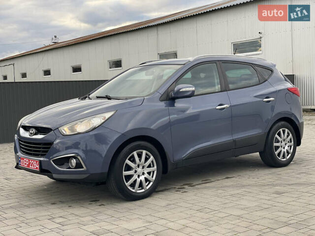 Синій Хендай іх35, об'ємом двигуна 2 л та пробігом 238 тис. км за 13300 $, фото 13 на Automoto.ua