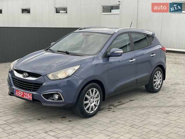 Синій Хендай іх35, об'ємом двигуна 2 л та пробігом 238 тис. км за 13300 $, фото 12 на Automoto.ua