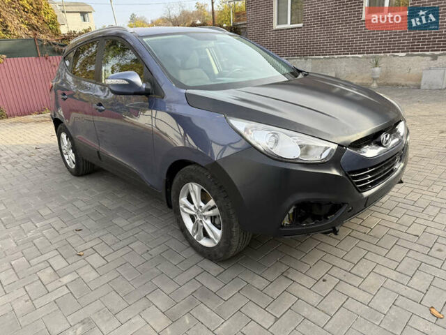 Синий Хендай их35, объемом двигателя 2 л и пробегом 175 тыс. км за 6500 $, фото 2 на Automoto.ua