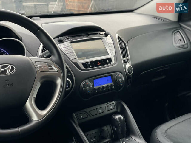 Синій Хендай іх35, об'ємом двигуна 2 л та пробігом 238 тис. км за 13300 $, фото 39 на Automoto.ua
