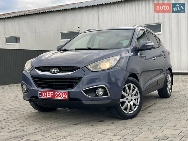 Синій Хендай іх35, об'ємом двигуна 2 л та пробігом 238 тис. км за 13300 $, фото 1 на Automoto.ua