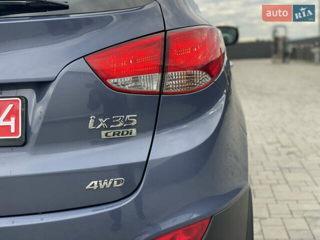 Синій Хендай іх35, об'ємом двигуна 2 л та пробігом 238 тис. км за 13300 $, фото 21 на Automoto.ua