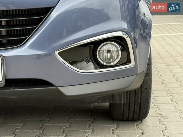 Синий Хендай их35, объемом двигателя 2 л и пробегом 234 тыс. км за 13550 $, фото 16 на Automoto.ua