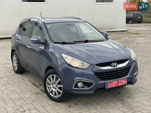 Синій Хендай іх35, об'ємом двигуна 2 л та пробігом 238 тис. км за 13300 $, фото 3 на Automoto.ua