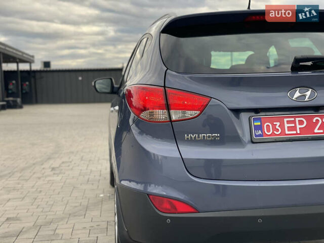 Синій Хендай іх35, об'ємом двигуна 2 л та пробігом 238 тис. км за 13300 $, фото 18 на Automoto.ua