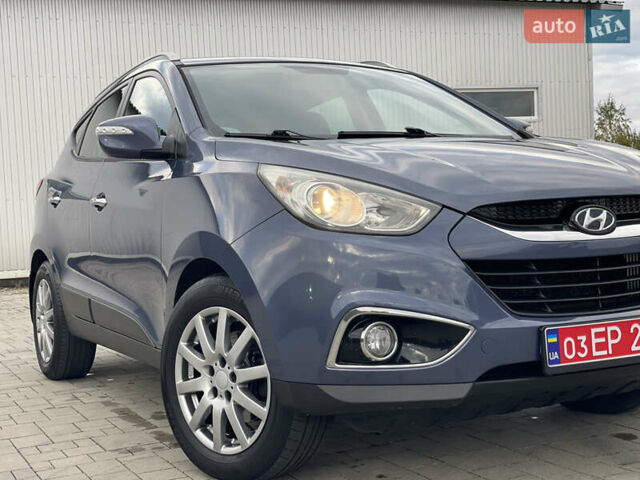 Синій Хендай іх35, об'ємом двигуна 2 л та пробігом 238 тис. км за 13300 $, фото 30 на Automoto.ua