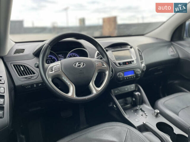 Синій Хендай іх35, об'ємом двигуна 2 л та пробігом 238 тис. км за 13300 $, фото 5 на Automoto.ua
