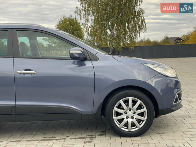 Синій Хендай іх35, об'ємом двигуна 2 л та пробігом 238 тис. км за 13300 $, фото 24 на Automoto.ua