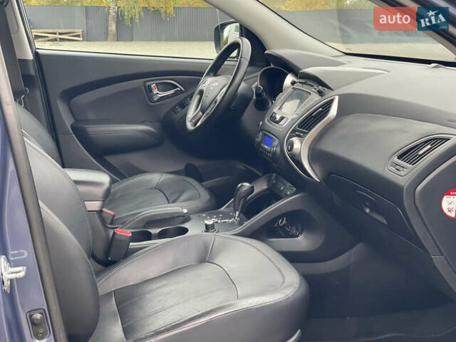 Синій Хендай іх35, об'ємом двигуна 2 л та пробігом 238 тис. км за 13300 $, фото 48 на Automoto.ua