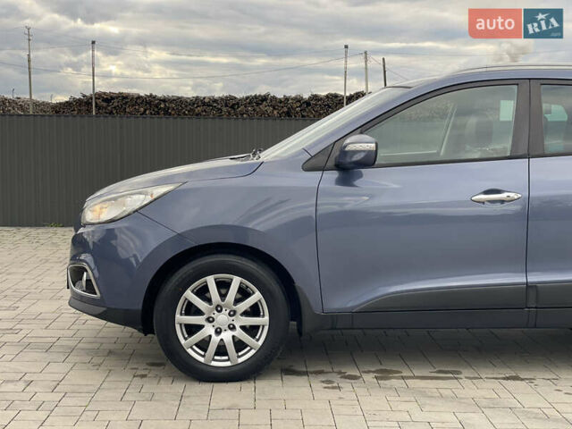 Синій Хендай іх35, об'ємом двигуна 2 л та пробігом 238 тис. км за 13300 $, фото 14 на Automoto.ua