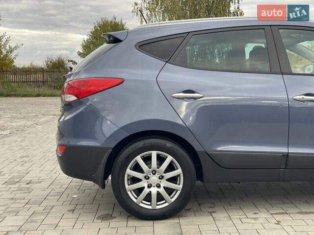 Синій Хендай іх35, об'ємом двигуна 2 л та пробігом 238 тис. км за 13300 $, фото 23 на Automoto.ua