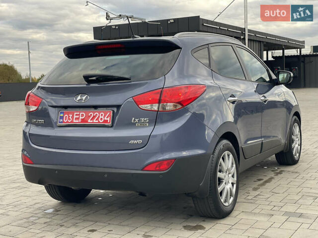 Синій Хендай іх35, об'ємом двигуна 2 л та пробігом 238 тис. км за 13300 $, фото 20 на Automoto.ua