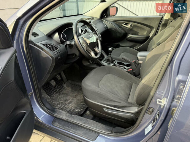 Синий Хендай их35, объемом двигателя 2 л и пробегом 175 тыс. км за 6500 $, фото 9 на Automoto.ua