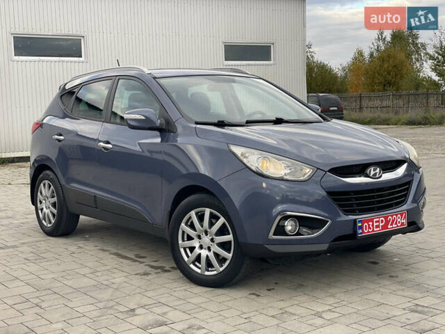 Синій Хендай іх35, об'ємом двигуна 2 л та пробігом 238 тис. км за 13300 $, фото 28 на Automoto.ua