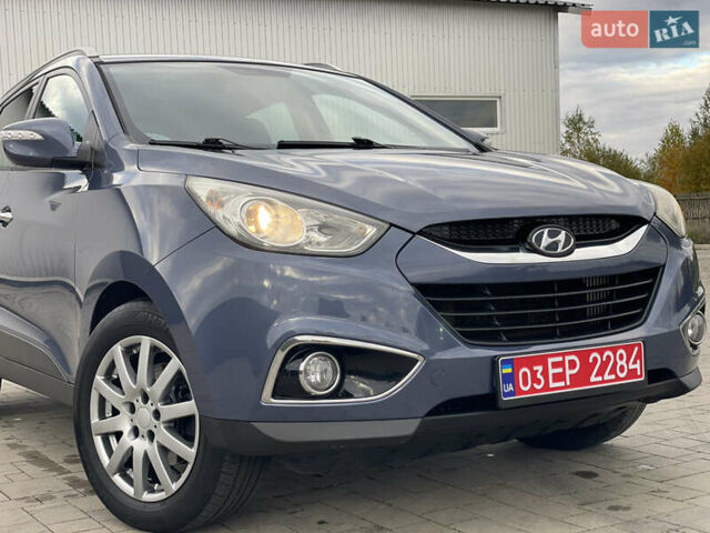 Синій Хендай іх35, об'ємом двигуна 2 л та пробігом 238 тис. км за 13300 $, фото 31 на Automoto.ua