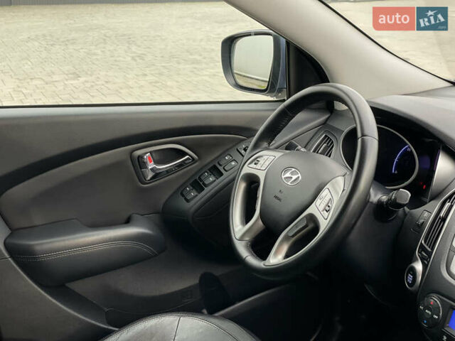 Синій Хендай іх35, об'ємом двигуна 2 л та пробігом 238 тис. км за 13300 $, фото 9 на Automoto.ua