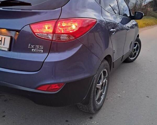 Синій Хендай іх35, об'ємом двигуна 2 л та пробігом 231 тис. км за 12800 $, фото 1 на Automoto.ua