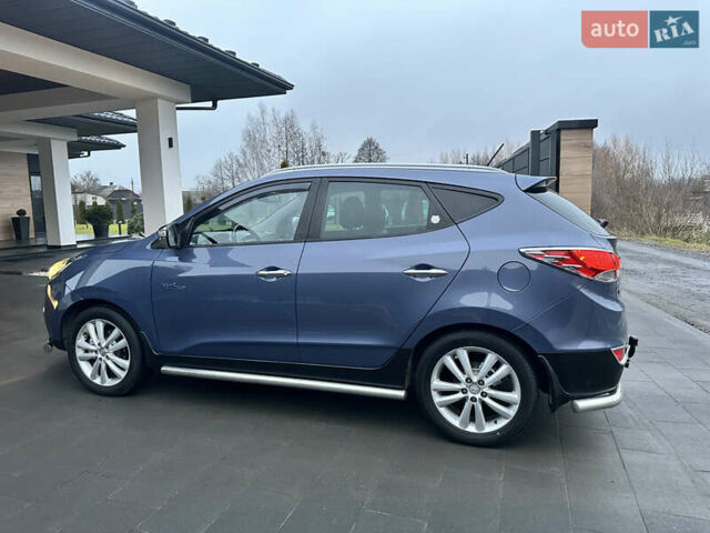 Синій Хендай іх35, об'ємом двигуна 1.7 л та пробігом 154 тис. км за 12700 $, фото 14 на Automoto.ua