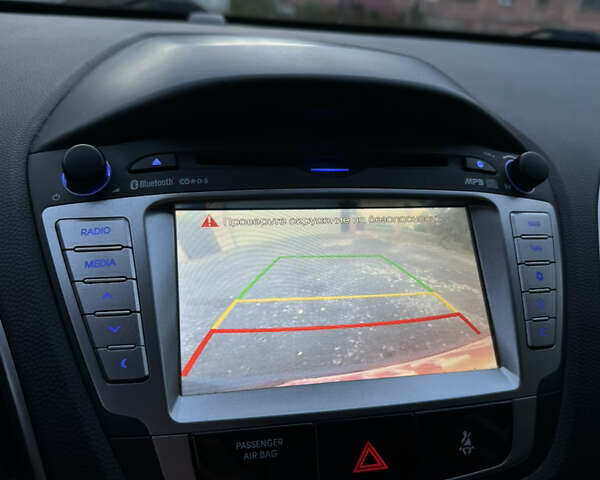 Синий Хендай их35, объемом двигателя 2 л и пробегом 219 тыс. км за 14950 $, фото 21 на Automoto.ua