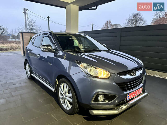 Синій Хендай іх35, об'ємом двигуна 1.7 л та пробігом 154 тис. км за 12700 $, фото 22 на Automoto.ua