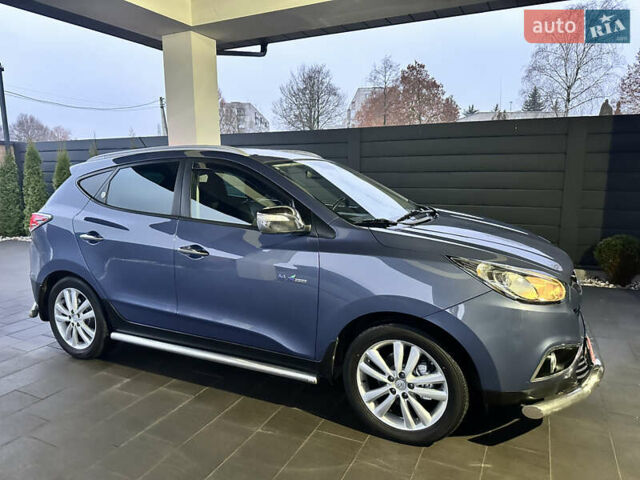 Синій Хендай іх35, об'ємом двигуна 1.7 л та пробігом 154 тис. км за 12700 $, фото 21 на Automoto.ua