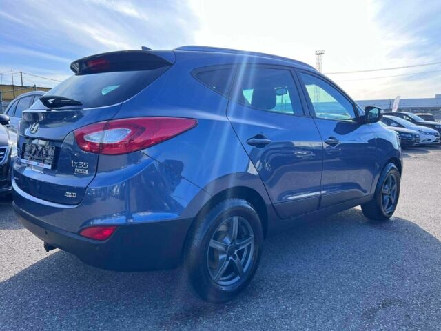 Синій Хендай іх35, об'ємом двигуна 2 л та пробігом 220 тис. км за 8500 $, фото 5 на Automoto.ua