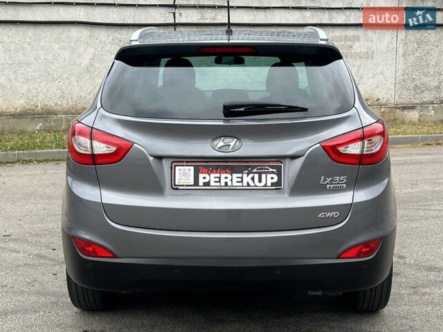 Синий Хендай их35, объемом двигателя 2 л и пробегом 150 тыс. км за 16400 $, фото 4 на Automoto.ua