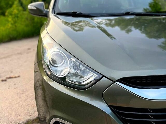 Зелений Хендай іх35, об'ємом двигуна 2 л та пробігом 115 тис. км за 11200 $, фото 9 на Automoto.ua