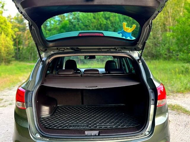 Зелений Хендай іх35, об'ємом двигуна 2 л та пробігом 115 тис. км за 11200 $, фото 6 на Automoto.ua