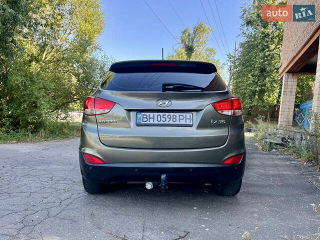 Зеленый Хендай их35, объемом двигателя 2 л и пробегом 186 тыс. км за 11000 $, фото 5 на Automoto.ua