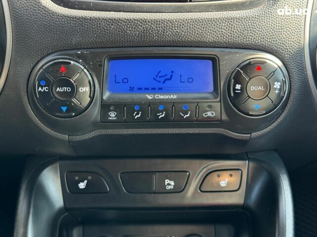 Зелений Хендай іх35, об'ємом двигуна 2 л та пробігом 246 тис. км за 10890 $, фото 32 на Automoto.ua