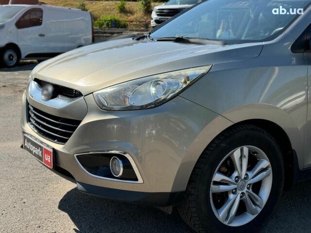 Зелений Хендай іх35, об'ємом двигуна 2 л та пробігом 246 тис. км за 10890 $, фото 8 на Automoto.ua