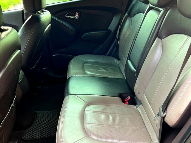 Зелений Хендай іх35, об'ємом двигуна 2 л та пробігом 115 тис. км за 11200 $, фото 13 на Automoto.ua