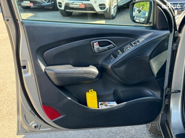 Зелений Хендай іх35, об'ємом двигуна 2 л та пробігом 246 тис. км за 10890 $, фото 16 на Automoto.ua